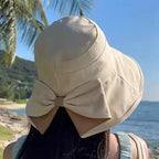 Women's sun hat with bow and wide brim – foldable, 360° protection