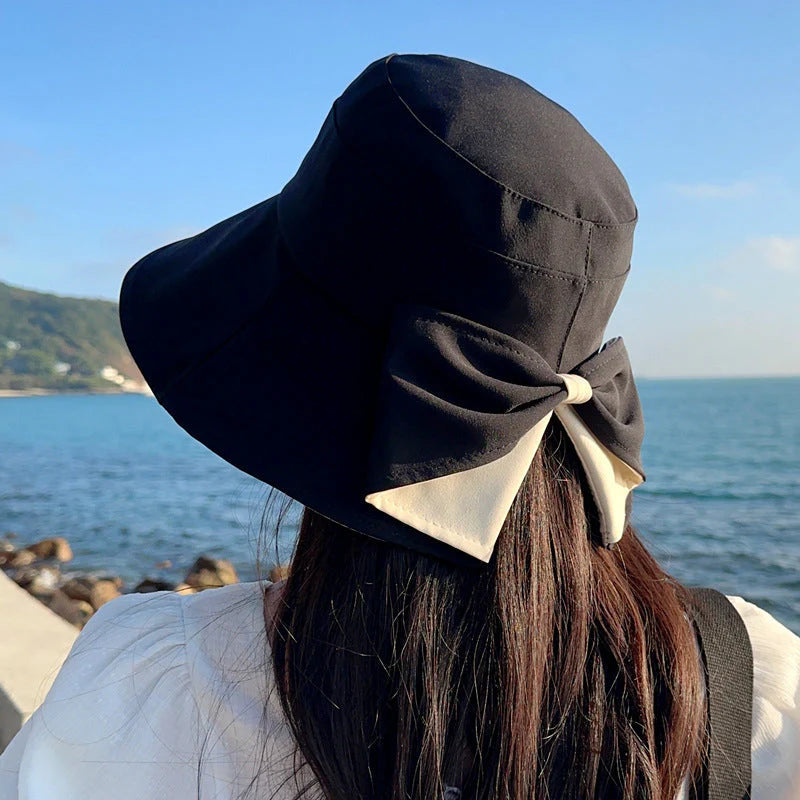 Women's sun hat with bow and wide brim – foldable, 360° protection
