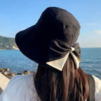 Women's sun hat with bow and wide brim – foldable, 360° protection